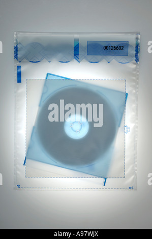 Compact disc inside a police forensic evidence bag Stock Photo
