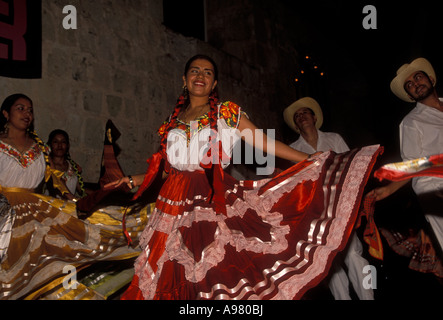 Mexican women and men, dancers dancing in the Camino Real Hotel in the city of Oaxaca de Juarez, Oaxaca State, Mexico Stock Photo