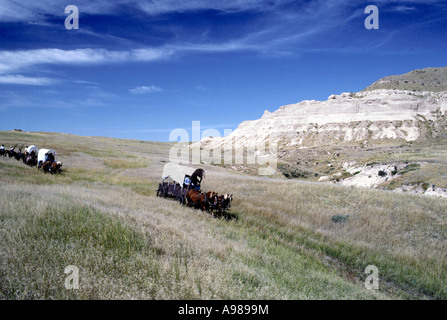 OREGON TRAIL WAGON TRAIN' CROSSES THE NEBRASKA PRAIRIE NEAR BAYARD. FALL. Stock Photo