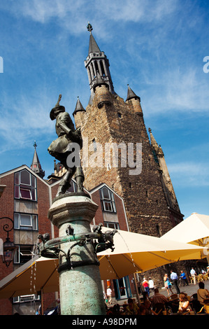 Chicken thief fountain, Huehnermarkt market and Rathaus town hall tower in Aachen, Germany, Europe Stock Photo