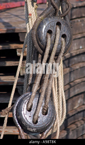 Rope and pulleys on a sailing ship,Essex,England,UK Stock Photo
