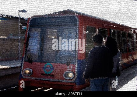 MOSAIC DLR. Processed image of Docklands train entering Greenwich  station, south-east London. Stock Photo