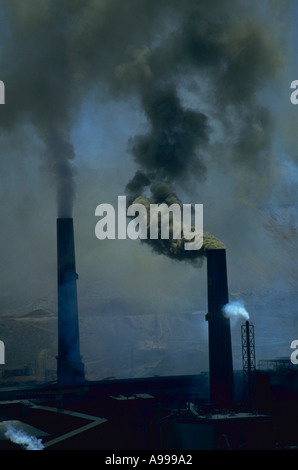 Smokestacks spew pollution from the smelters at the Chuquicamata Copper Mine in Calama northern Chile Stock Photo