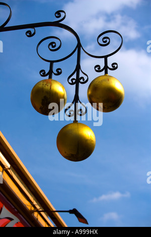 Pawnbrokers' three gilded balls near "Camden Market", London Stock Photo