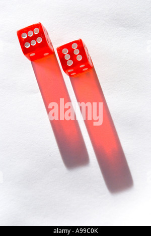 A red pair of dice on a white background Stock Photo