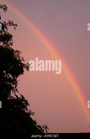 A Rainbow over a sky during a wet day. Votorantim, São Paulo, Brazil. 09 Feb 2006, at 06:05pm on thursday. Stock Photo