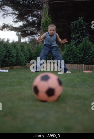 boy as goalkeeper getting ready for penalty kick Stock Photo