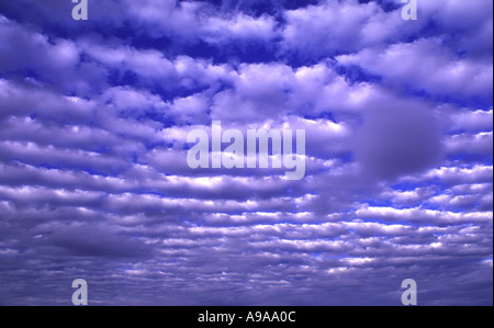 fluffy layered clouds www galleriesepifanoff com Stock Photo
