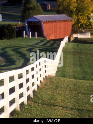 WHITE WOODEN FENCE HARMON COVERED BRIDGE PLUM CREEK INDIANA COUNTY PENNSYLVANIA USA Stock Photo