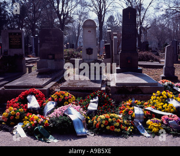 Wreaths leaning against graves in the Central Cemetery Zentralfriedhof, Vienna, Austria Stock Photo