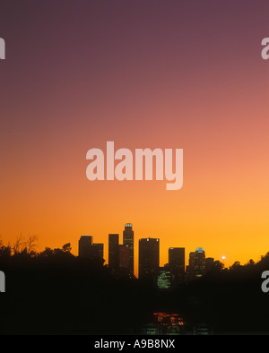 Silhouette of the downtown Los Angeles skyline with a colorful fading ...