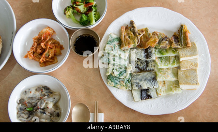 Side dishes at a typical Korean restaurant in South Korea. Stock Photo