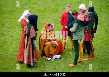 The Company of Chivalry reenactment of medieval life in the year 1370 at Caerphilly Castle South Wales UK Stock Photo