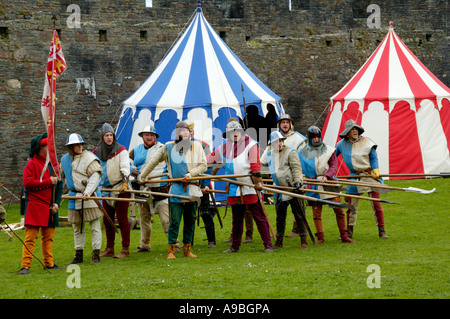 The Company of Chivalry reenactment of medieval life in the year 1370 at Caerphilly Castle South Wales UK Stock Photo