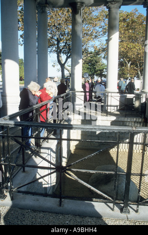 Tourists photographing the Plymouth  Rock at Plymouth Massachusetts New England USA Stock Photo