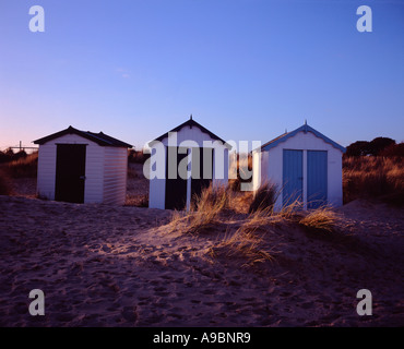 Three beach huts along the beach at Southwold, Suffolk,  UK Stock Photo