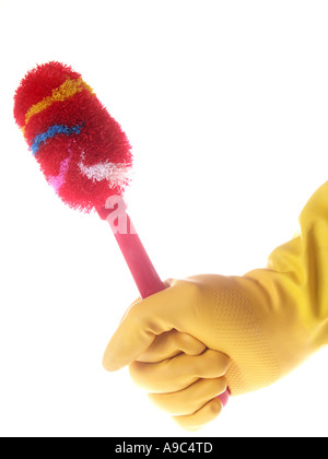 Hand in yellow rubber glove holding a red dish scrubber Stock Photo