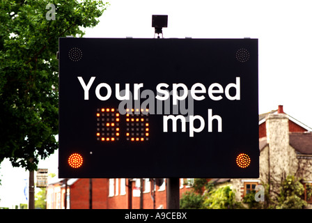 Automatic vehicle speed indicator in 30 mph limit, Barford, Warwickshire, England, UK Stock Photo