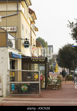 Shops and restaurants on the main street Merville Franceville Plage Calvados Normandy France Stock Photo