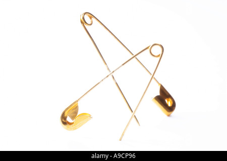 Golden safety pins, close-up Stock Photo