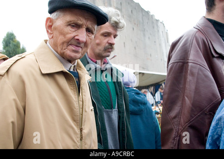 Senior shoppers at the Balucki Rynek outdoor sidewalk market. Lodz Poland Stock Photo