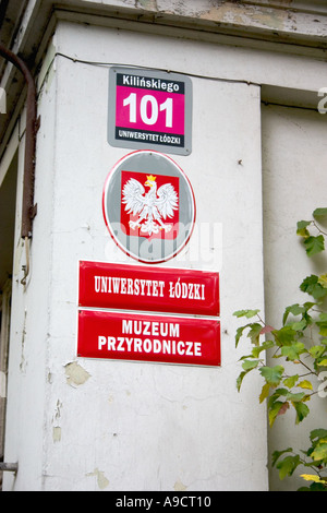 Museum sign and The White Eagle, Polish National Coat of Arms. Lodz Poland Stock Photo