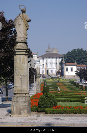 Statue magnificent geometric gardens flowers main square Guimaraes Porto Norte North Minho Portugal Iberia Europe Stock Photo