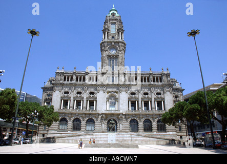 Magnificent imposing clock tower building typical architecture big main square old town centre Porto Portugal Europe Stock Photo