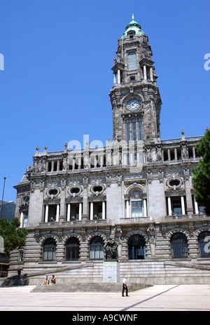 Magnificent imposing clock tower building typical architecture big main square old town centre Porto Portugal Europe Stock Photo