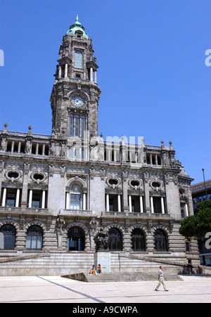 Magnificent imposing clock tower building typical architecture big main square old town centre Porto Portugal Europe Stock Photo