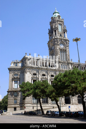 Magnificent imposing clock tower building typical architecture big main square old town centre Porto Portugal Europe Stock Photo