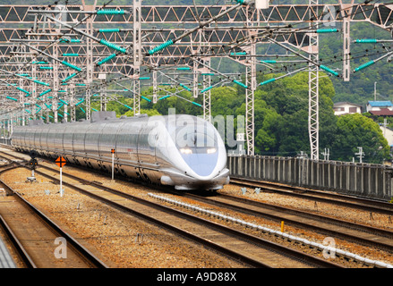 Shinkansen Series 500 passing at high speed through Aioi station, Japan JP Stock Photo