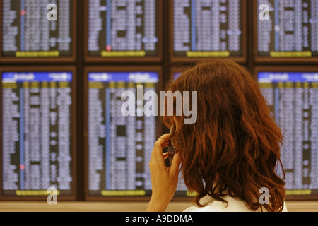 Woman checking the  table Stock Photo