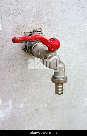 Water faucet spigot with red lever. Zawady Poland Stock Photo
