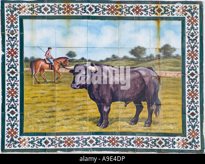 Tiles plaque on the external wall of the bullring at Mijas Spain Built in 1900 this is the only square bull ring in existence Stock Photo
