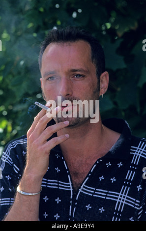 A man smoking Stock Photo - Alamy