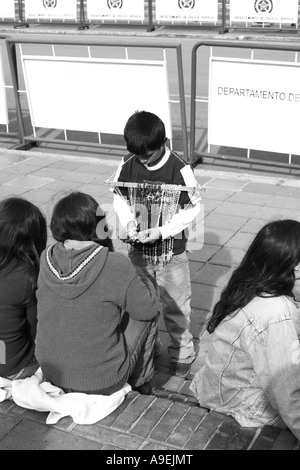 child selling necklaces in the street. Tunja, Colombia, South America Stock Photo