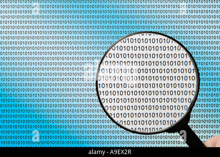 Binary Code and a Magnifying Glass Stock Photo