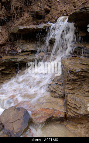 waterfall cascading over rocks Stock Photo