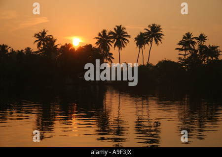 Golden sunset over Vembanad Lake in the Backwaters near Alappuzha (Alleppey), Kerala, South India Stock Photo