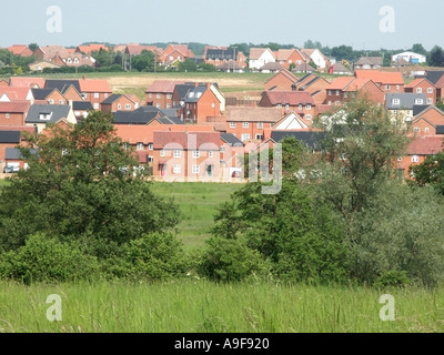 Hadleigh green field housing development spreading out to in fill space created by improved A1074 bypass road Suffolk East Anglia England UK Stock Photo