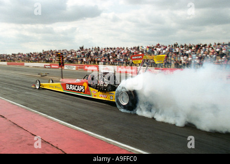 burnout top alcohol drag racing car at santa pod raceway england Stock Photo