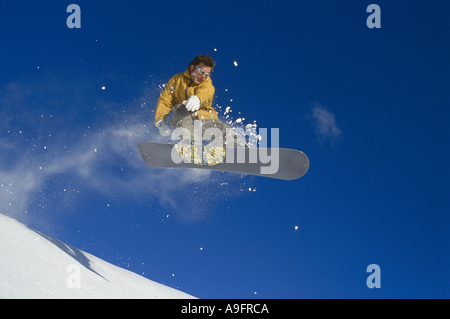 snowboader, jumping in midair. Stock Photo