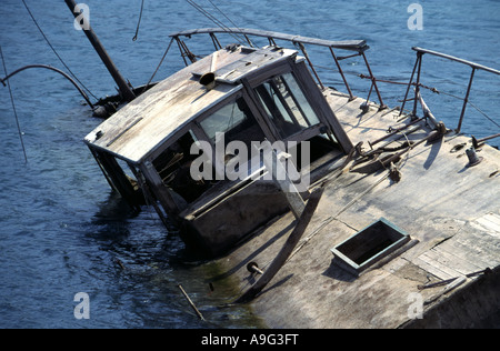 sinking shipwreck Stock Photo