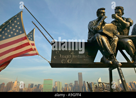 New York City: Sculpture of iron workers having lunch sitting on a beam ...