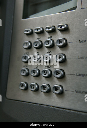 a detail of a BT payphone number pad old traditional London contact communication talking Stock Photo