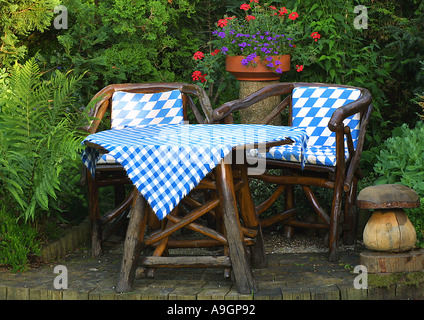 seat, two garden chairs with garden table, chair cushion and tablecloth in bavarian blue-white Stock Photo