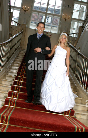 bridal couple standing on stairs. Stock Photo