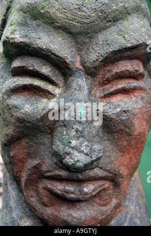 Carved Face in Stone Stock Photo