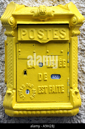 Close up of old fashioned postbox in small French town 2007 Stock Photo